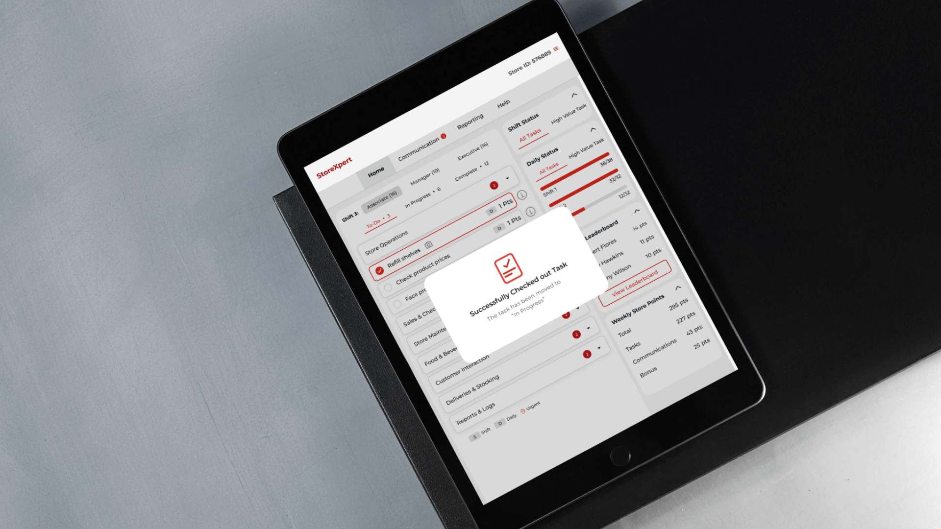 StoreXpert task confirmation shown on a tablet